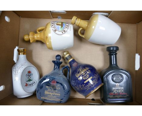 A collection of Wade Whiskey &amp; Spirit Ceramic bottles to include Dimple, Harvey Sherry, Buchanan's etc These were removed