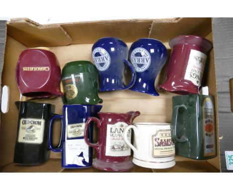 A collection of Wade Whiskey &amp; Spirit Ceramic Advertising Water Jugs to include Old Crow, Bushmills, Langs etc These were