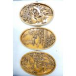 Three Carved Wood Oriental Oval Wall Panels, each diameter at widest 33cm(3)