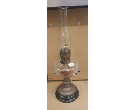 A quality handblown glass and base metal oil lamp, overall height 61cm. 