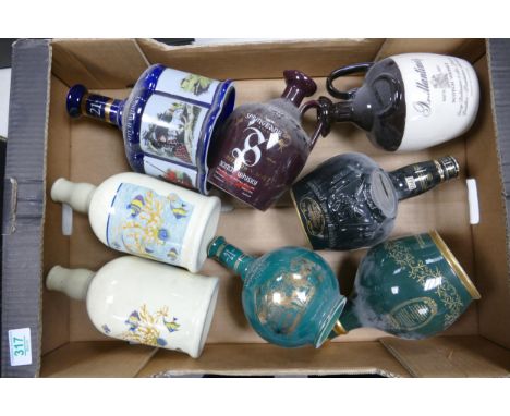 A collection of Wade Whiskey &amp; Spirit Ceramic bottles to include Spring Bank, Highland Mountain, Ballantines etc These we