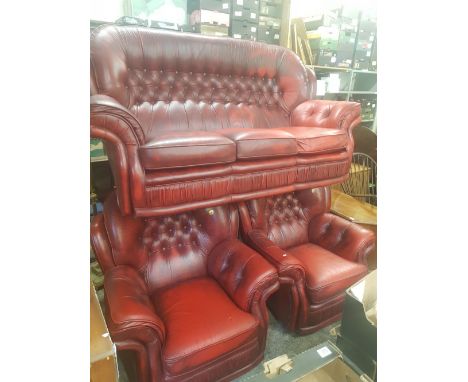 Oxblood leather Chesterfield high back 3 seater sofa and 2 matching armchairs. 