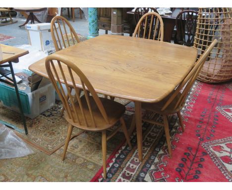 ERCOL GOLDEN DAWN DROP LEAF DINING TABLE WITH FOUR ERCOL STICK BACK CHAIRS 