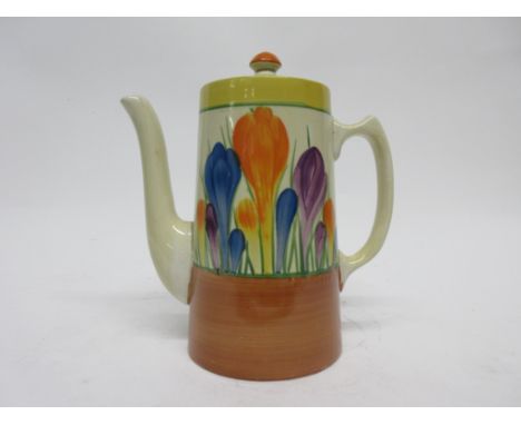 Clarice Cliff coffee pot in the Crocus pattern, decorated in typical fashion, 18cm high