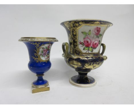 Derby porcelain campana vase, the front with a panel with Billingsley type roses and a Derby red mark to base, together with 