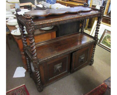 Oak carved buffet, crested at the corners with coronet finials over two open shelves and cupboard below, 123cm wide