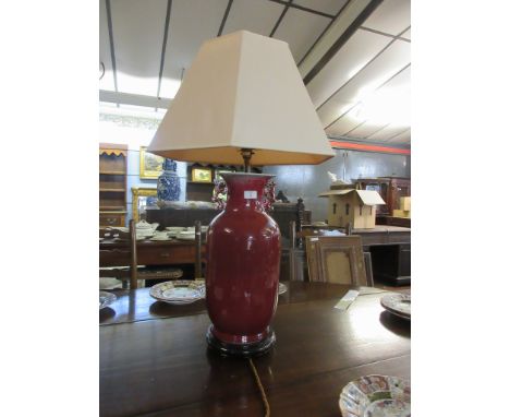 Chinese sang de beouf vase on wooden base converted to a table lamp