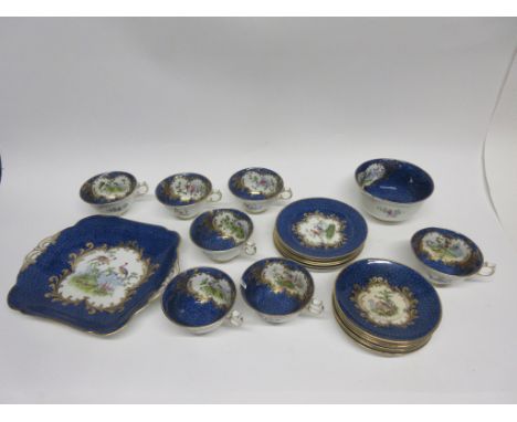 Part Crescent china tea set by George Jones, the mottled blue ground decorated with birds in Worcester style, comprising 7 cu