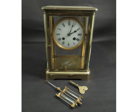 A 19th Century Japy Freres four glass mantel clock with 8 day movement striking on a gong, with mercury pendulum and key, Rom