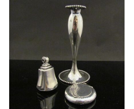 A sterling silver candlestick white metal powder compact and Deco style bell (3) 