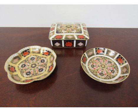 Three pieces of Royal Crown Derby bone china, lidded trinket pot and two pin dishes, all marked 1128 to base (3) 