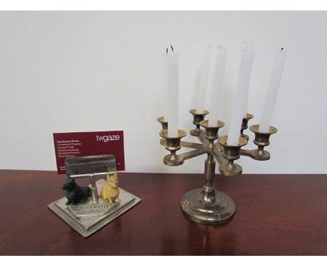 A "Black and White" Scotch Whisky advertising card holder together with a seven sconce candelabrum 