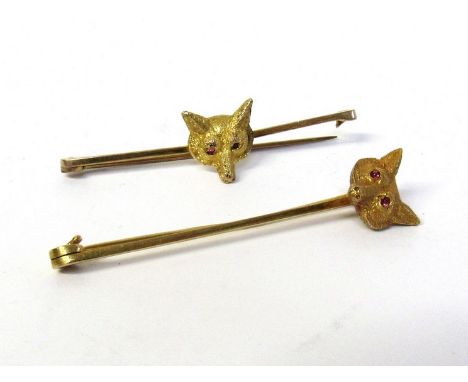 Two 9ct gold hunting tie pins with fox head detail, ruby eyes