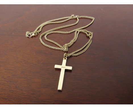 A 9ct gold cross pendant hung on 72cm long neck chain, 18.3g