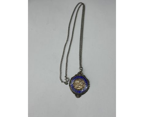 A SILVER NECKLACE WITH HALLMARKED ENAMEL FOOTBALL MEDAL