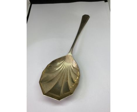 A LARGE HALLMARKED SHEFFIELD SILVER SERVING SPOON