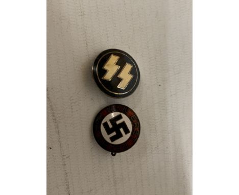 A NAZI GERMANY PARTY ENAMEL BADGE AND AN SS BADGE