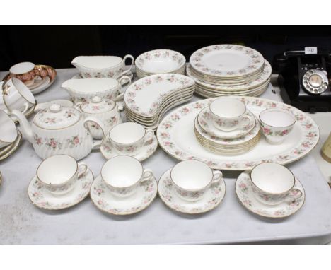 A LARGE QUANTITY OF MINTON 'SPRING BOUQUET' DINNER AND TEA WARE TO INCLUDE A TEAPOT, CREAM JUG, SUGAR BOWL, LARGE SERVING PLA