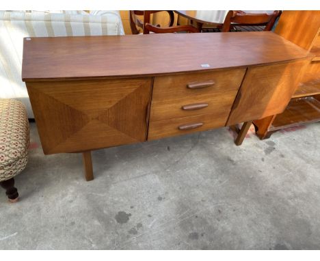 A RETRO TEAK BOW FRONTED SIDEBOARD ENCLOSING THREE DRAWERS AND TWO CUPBOARDS, 60" WIDE