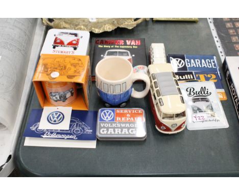A QUANTITY OF VOLKSWAGEN COLLECTABLES TO INCLUDE A MUG, FUDGE TIN, METAL SIGNS, MODELS, ETC.,