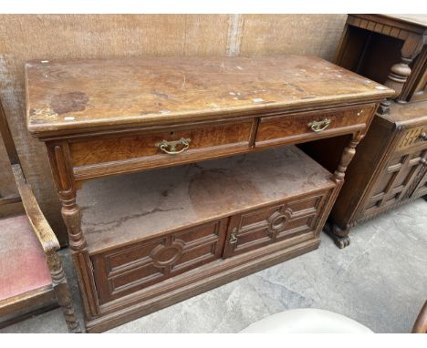 A VICTORIAN OAK AND WALNUT BUFFET SIDEBOARD ENCLOSING TWO DRAWERS AND TWO CUPBOARDS, 56' WIDE
