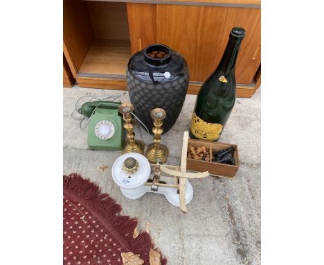 AN ASSORTMENT OF ITEMS TO INCLUDE A RETRO ROTARY DIAL TELEPHONE, A CHESS SET AND A PAIR OF BRASS CANDLESTICKS