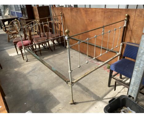 A VICTORIAN 4'6" BRASS AND IRON BEDSTEAD