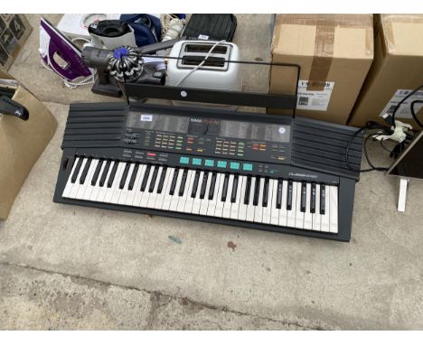 A YAMAHA PSR-48 KEYBOARD