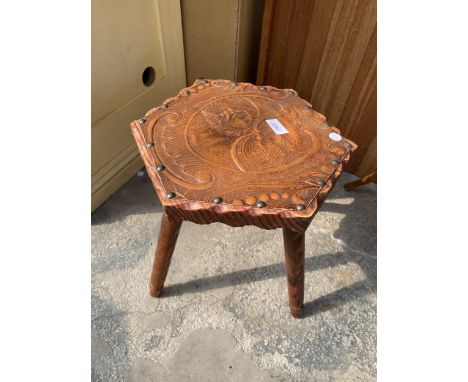 A SPANISH STYLE PINE STOOL