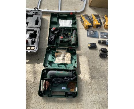 A BOSCH DRILL AND A BOSCH SANDER BOTH WITH CARRY CASES