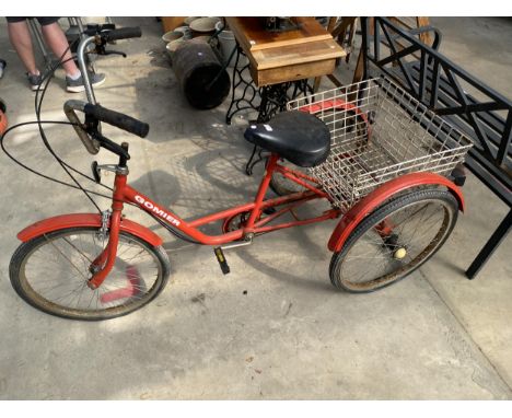 A GOMIER TRICYCLE WITH REAR BASKET