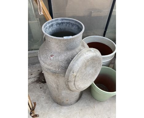 A VINTAGE ALLOY LONGSLOW DAIRY MILK CHURN WITH LID