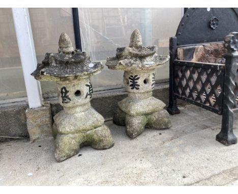 A PAIR OF CONCRETE PERGODA GARDEN ORNAMENTS