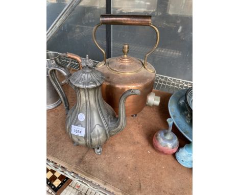 A LARGE COPPER KETTLE AND SILVER PLATE COFFEE POT