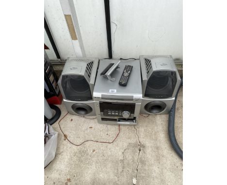 AN HITACHI STEREO SYSTEM AND TWO SPEAKERS
