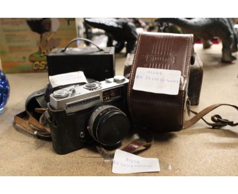 A VINTAGE TARON JL CAMERA, KODAK BROWNIE BOX CAMERA AND AN ELECTRIC MOVIE CAMERA