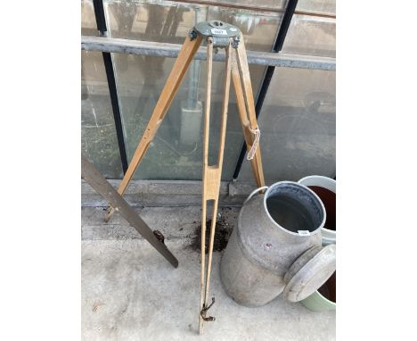A VINTAGE LAZER LEVEL TRIPOD STAND