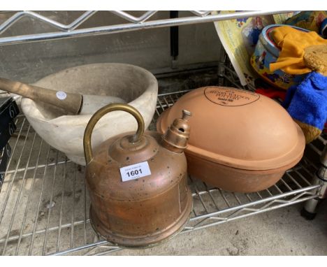 A LARGE PESTLE AND MORTAR, A TERRACOTTA POT AND A COPPER VESSEL