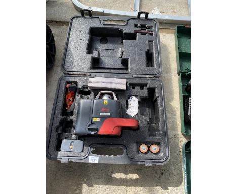 A PART COMPLETE LEICA LASER LEVEL WITH CARRY CASE
