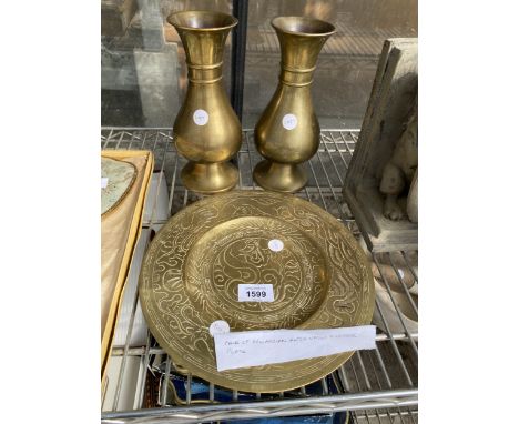 A BRASS CHARGER AND TWO BRASS VASES