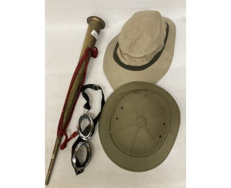 A PITH HELMET, SUN HAT, GOGGLES AND A BRASS HORN