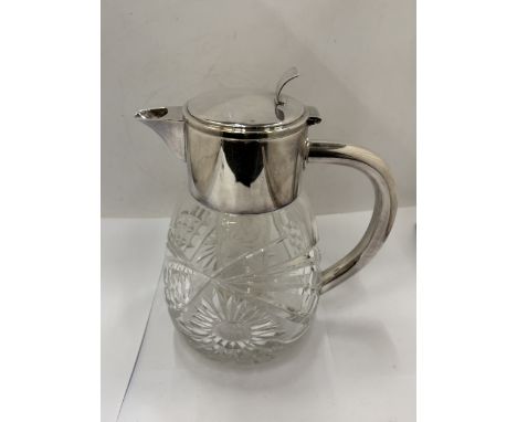 A SILVER PLATED AND CUT GLASS LEMONADE JUG - (H) 27 CM
