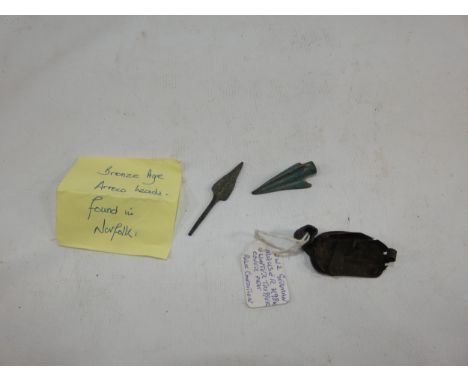 TWO BRONZE AGE ARROW HEADS AND A WORLD WAR II MAUSER K98K WINTER TRIGGER COVER