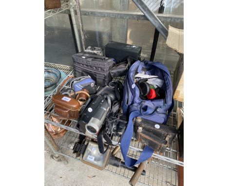 AN ASSORTMENT OF CAMERA EQUIPMENT TO INCLUDE A FUJIFILM CAMERA, CAMCORDER AND ACCESSORIES ETC