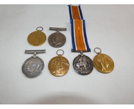 A COLLECTION OF THREE WORLD WAR I MEDAL PAIRS AWARDED TO 31178 PRIVATE T.A. McNABOE MANCHESTER REGIMENT, 61673 PRIVATE A. WIL