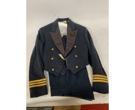 AN RAF OFFICERS MESS UNIFORM COMPRISING JACKET, WAISTCOAT AND TROUSERS