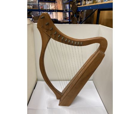 AN APPRENTICE PIECE, TABLE TOP WOODEN IRISH HARP, HEIGHT 45CM