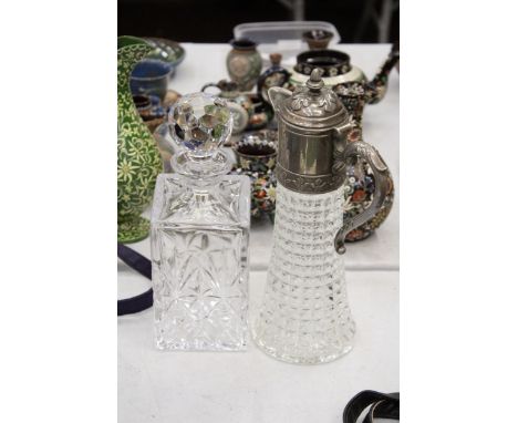 A VINTAGE CLARET JUG WITH PEWTER TOP PLUS A HEAVY CUT GLASS DECANTER