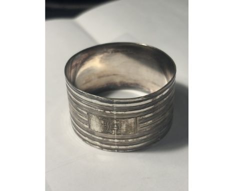 A STERLING SILVER NAPKIN RING