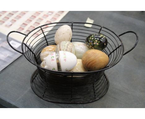 TEN EGGS IN A METAL EGG HOLDER TO INCLUDE WOODEN, ONYX AND CERAMIC